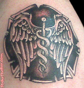 ems tattoo with firefighter maltese cross