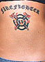 female maltese fire fighter tattoo