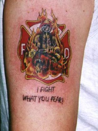 Firefighter walking through flames and maltese cross