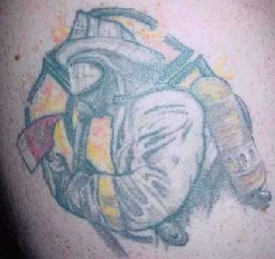 firefighter with axe and maltese cross tattoo